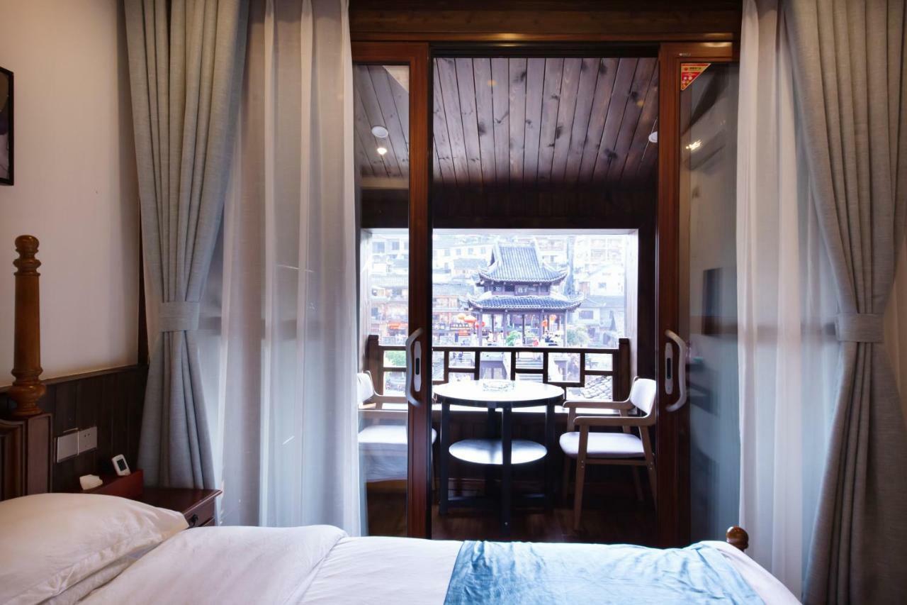 Fenghuang Slowly Time Inn Exteriör bild